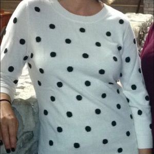 White sweater with black polka dots